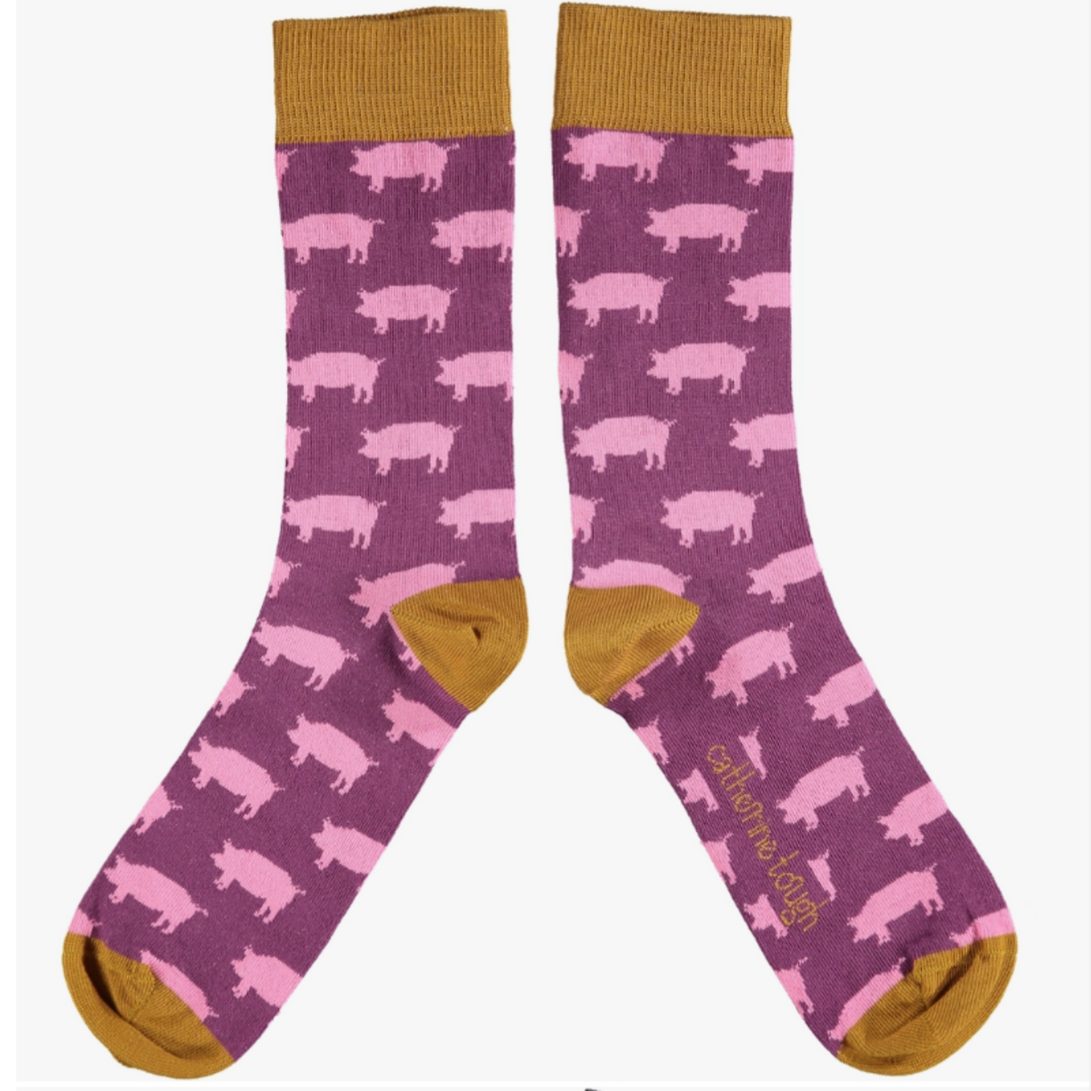 Catherine Tough Pig cotton men&#39;s crew socks. The design features pink pigs on a plum base framed with ginger cuffs, heels &amp; toes