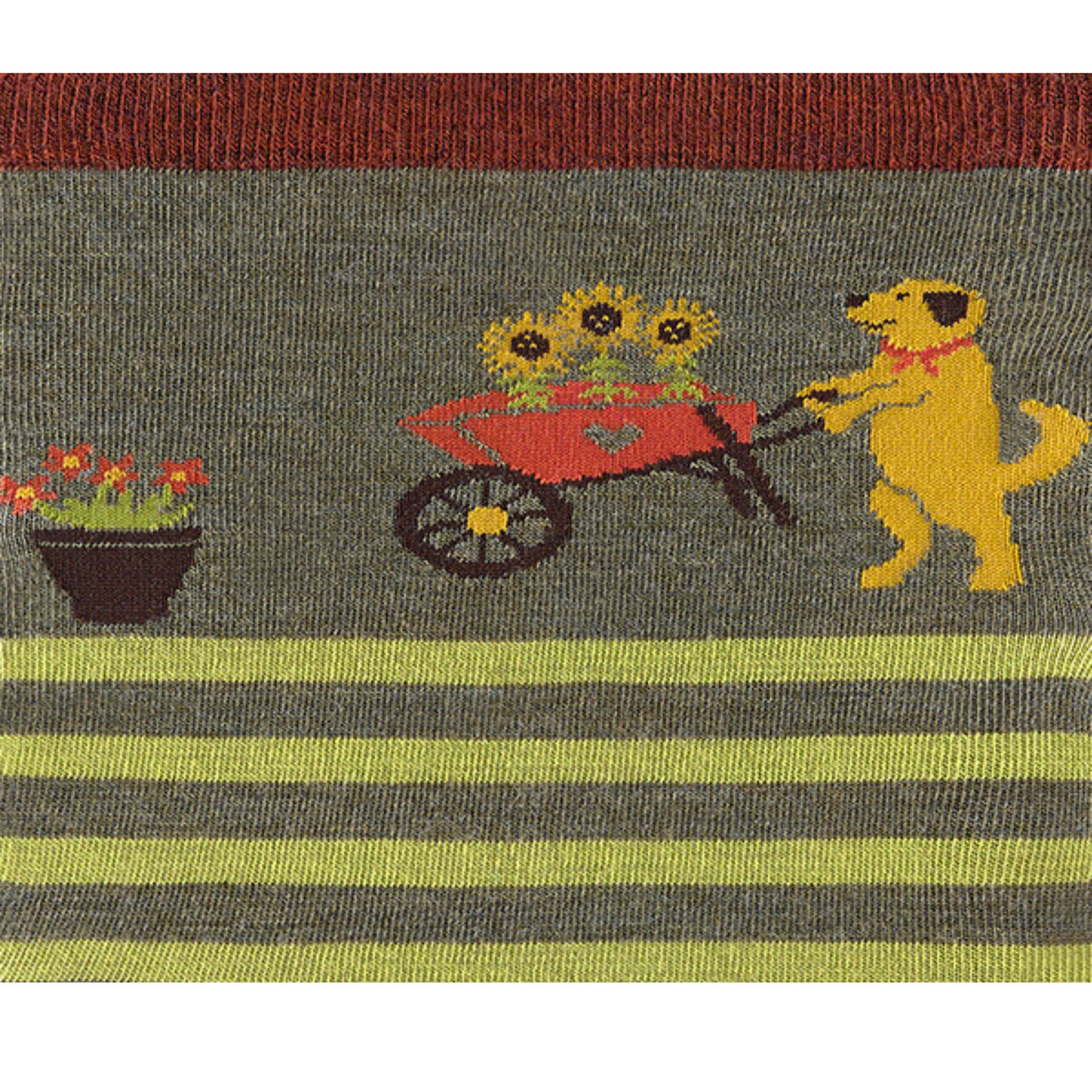 Darn Tough 6037 Animal Haus Lightweight Cushion Crew women&#39;s sock featuring olive green sock with green stripes and yellow dog with wheelbarrow of sunflowers at top. Detail of yellow dog.