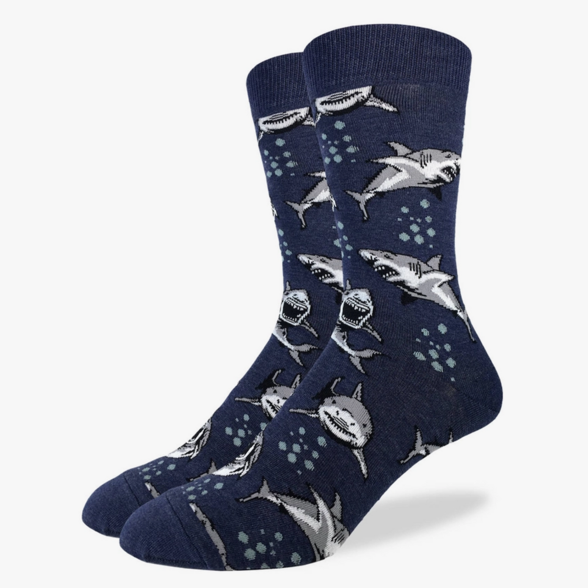 Good Luck Sock Shark Attack men&#39;s crew sock featuring navy blue sock with white and gray sharks on display feet
