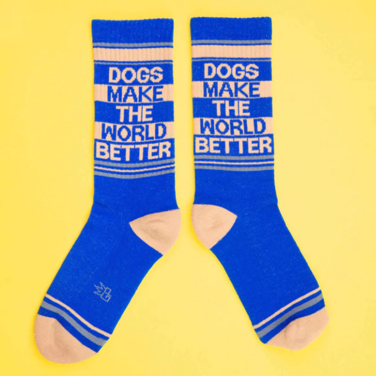 Gumball Poodle Dogs Make the World Better women&#39;s and men&#39;s sock featuring blue sock with &quot;Dogs Make the World Better&quot; in all capital letters on display