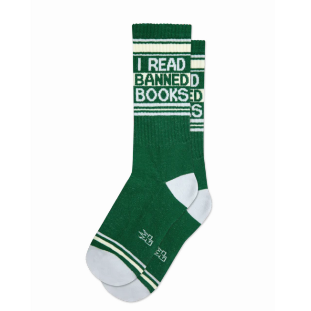 Gumball Poodle I Read Banned Books women&#39;s and men&#39;s crew sock featuring green sock with &quot;I Read Banned Books&quot; at top. Socks shown flat from side. 