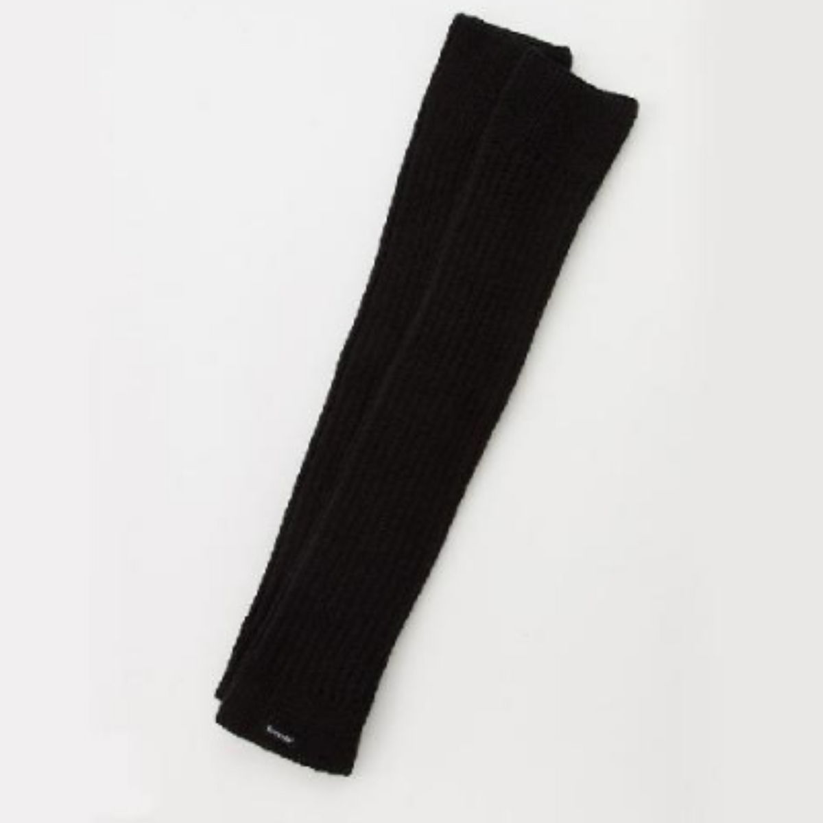 Knitido Ribbed Leg Warmer in black on display
