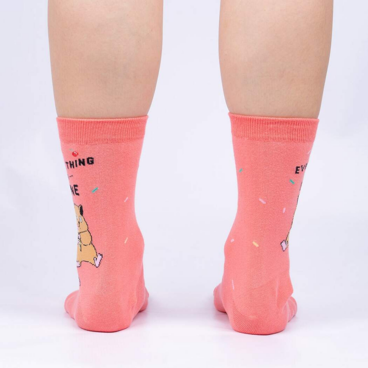 Sock It To Me Everything is Fine women&#39;s pink crew sock featuring &quot;Everything Is Fine&quot; with hamster holding ice cream cone with dropped ice cream on model from back