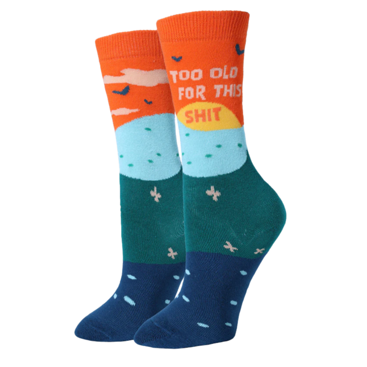 Sock Harbor Too Old For This Shit women&#39;s crew sock featuring orange, blue, and teal sock that says &quot;Too Old For This Shit&quot;. Socks shown on display feet. 