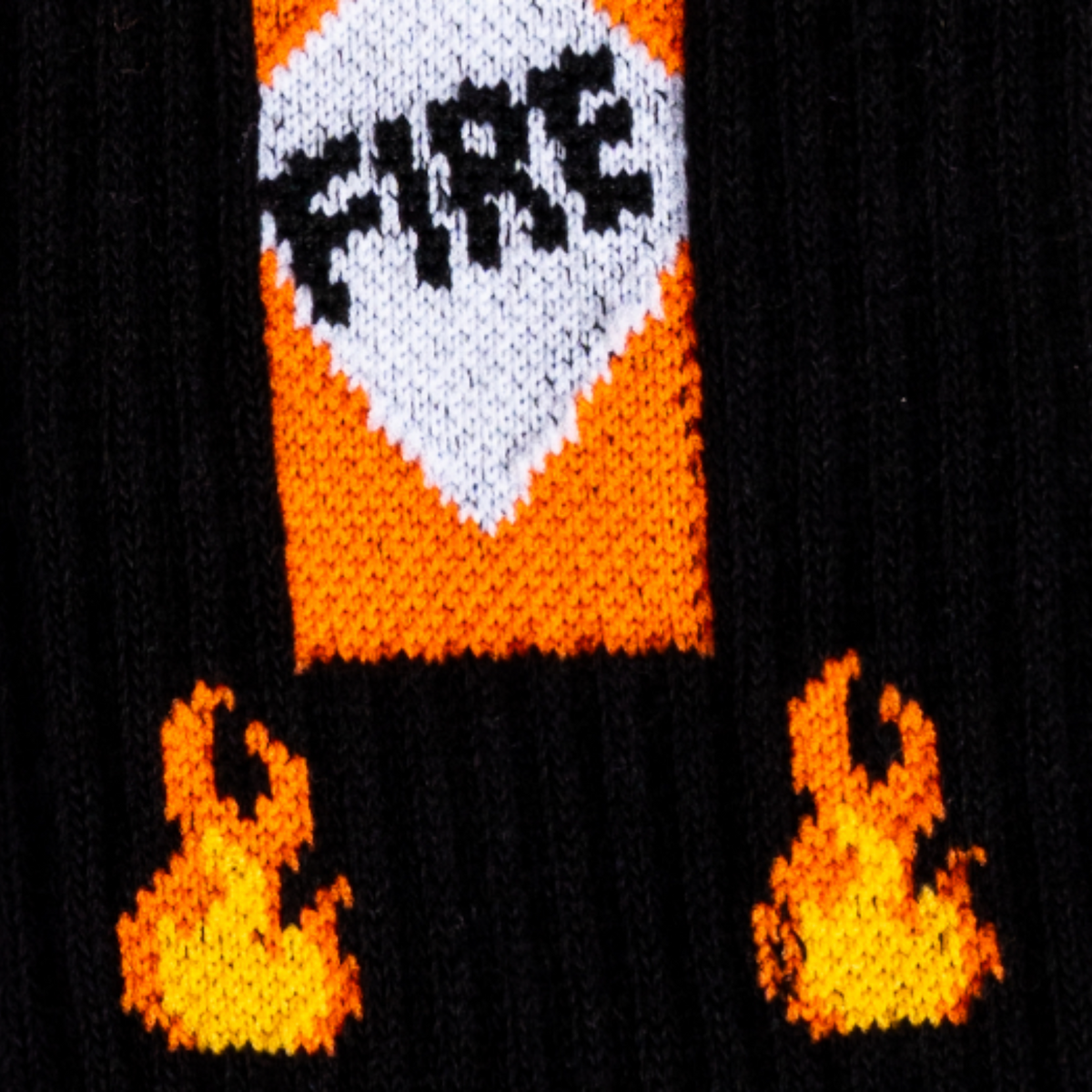 Detail of Sock It To Me Fire athletic crew men&#39;s sock featuring black socks with an image of flames and hot sauce bottle. 