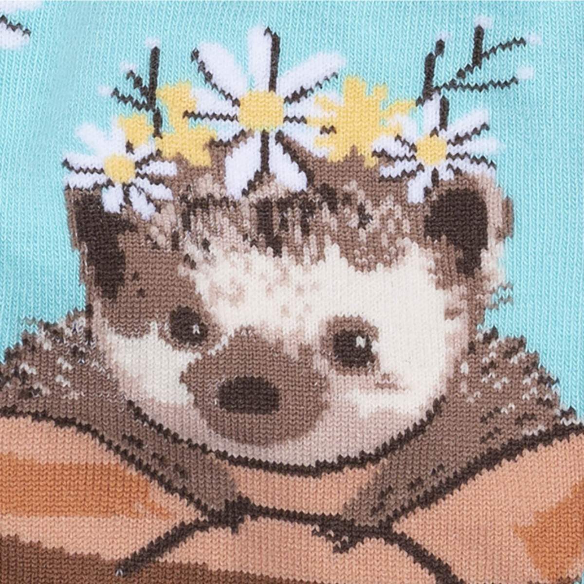 Detail of Sock It To Me My Dear Hedgehog women&#39;s crew sock featuring light blue sock with flowers all over and a hedgehog in a flower pot. 