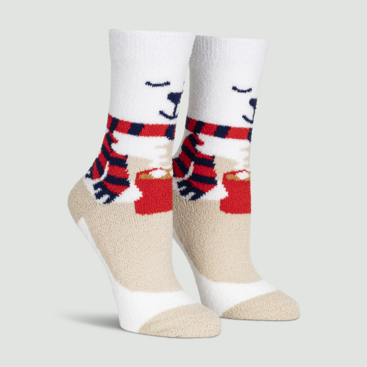 Sock It To Me So Beary Cute women&#39;s slipper sock featuring Polar Bear holding red mug of hot chocolate on display feet