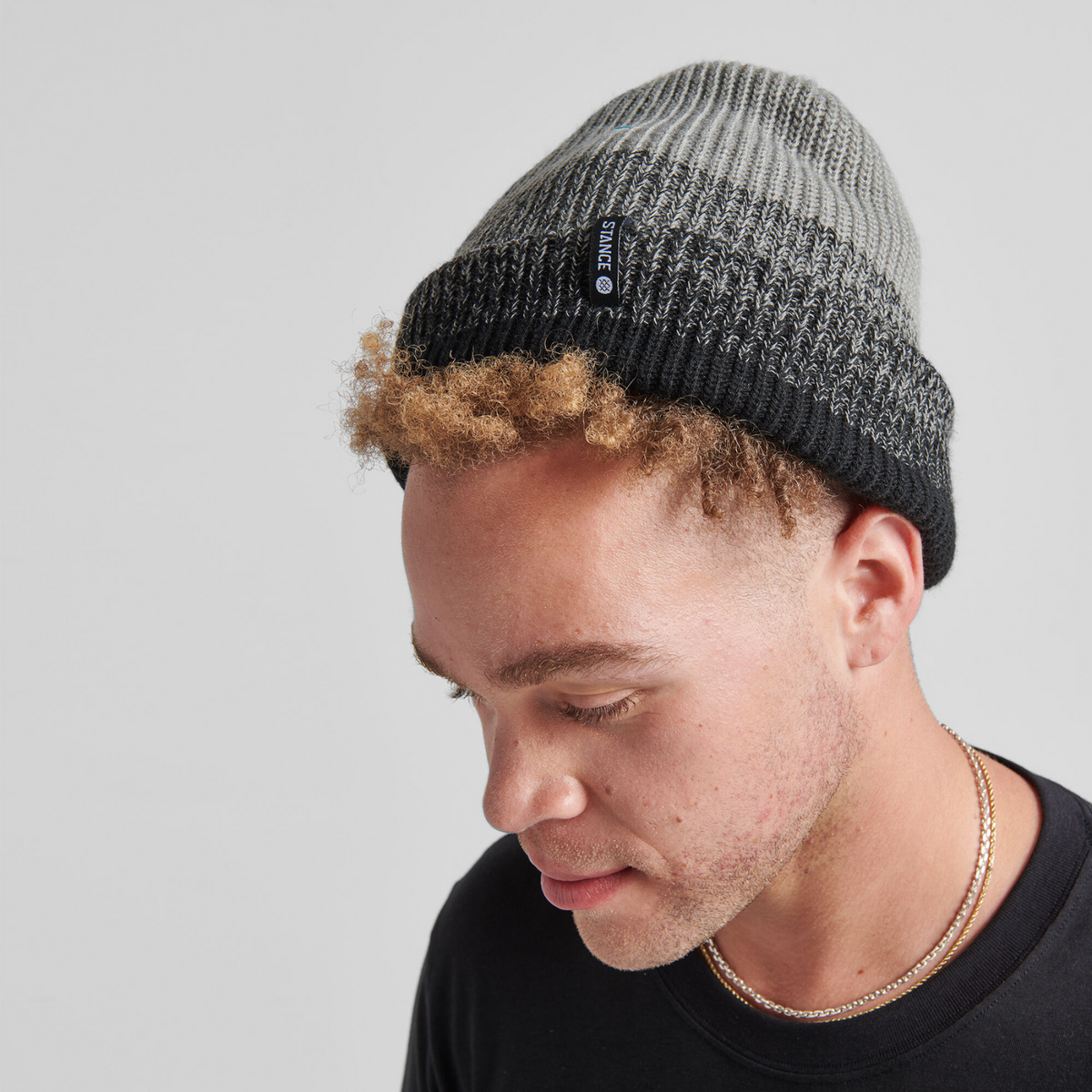 Stance Fade Beanie featuring gray and black pattern on model