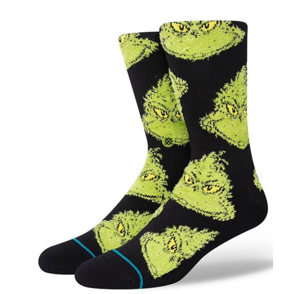 Stance The Grinch Mean One men&#39;s crew sock featuring a black sock with images of The Grinch all over. Socks shown on display feet. 