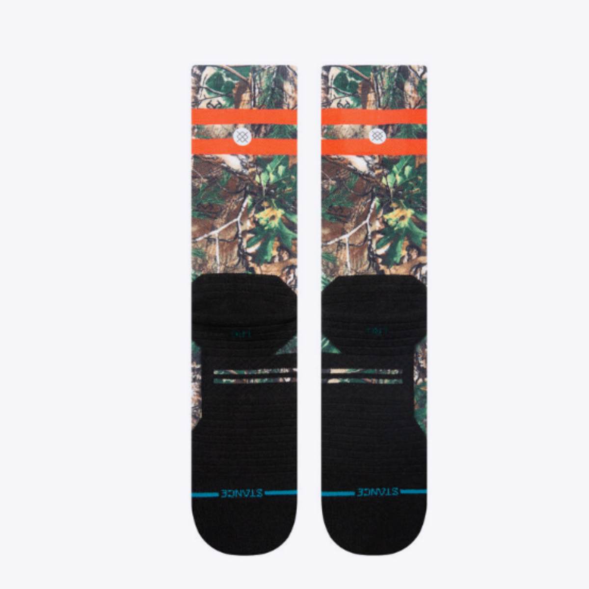 Bottom of Stance Xtra Light Xtra Performance men&#39;s crew sock featuring all-over camouflage pattern and two orange stripes at top. 