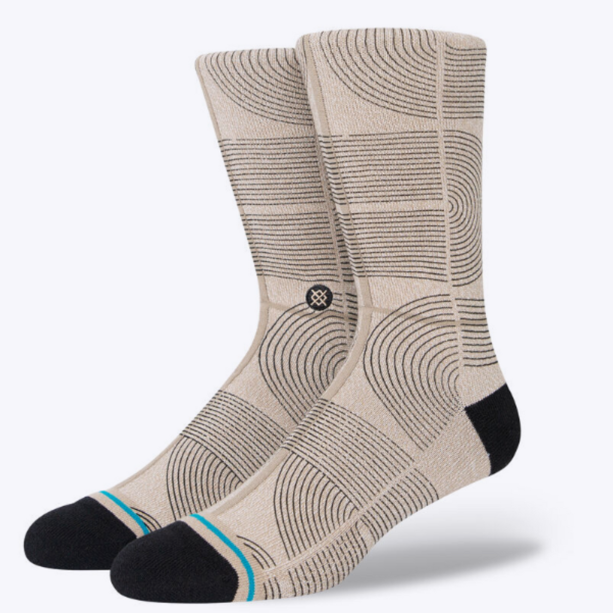 Stance Zen men&#39;s crew sock featuring beige sock with black toe and heel and black mid-century modern style geometric lines all over. Socks shown on display feet. 