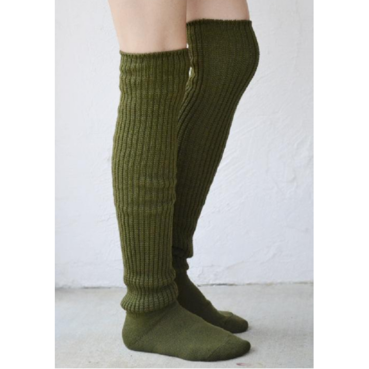 Tabbisocks Scrunchy Over the Knee women&#39;s socks shown in olive color on model.