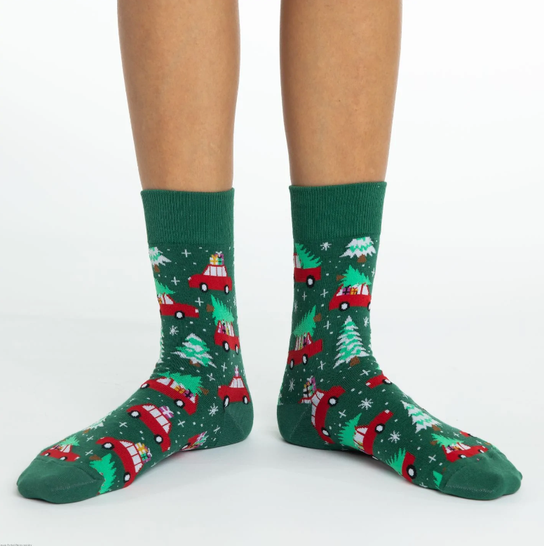 Good Luck Sock Christmas Trees women&#39;s green sock with red cars and trucks with presents on model