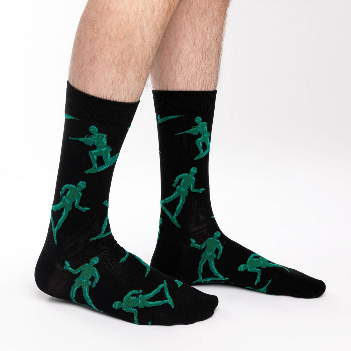 Good Luck Sock men&#39;s black crew sock with green Toy Soldiers all over on male model