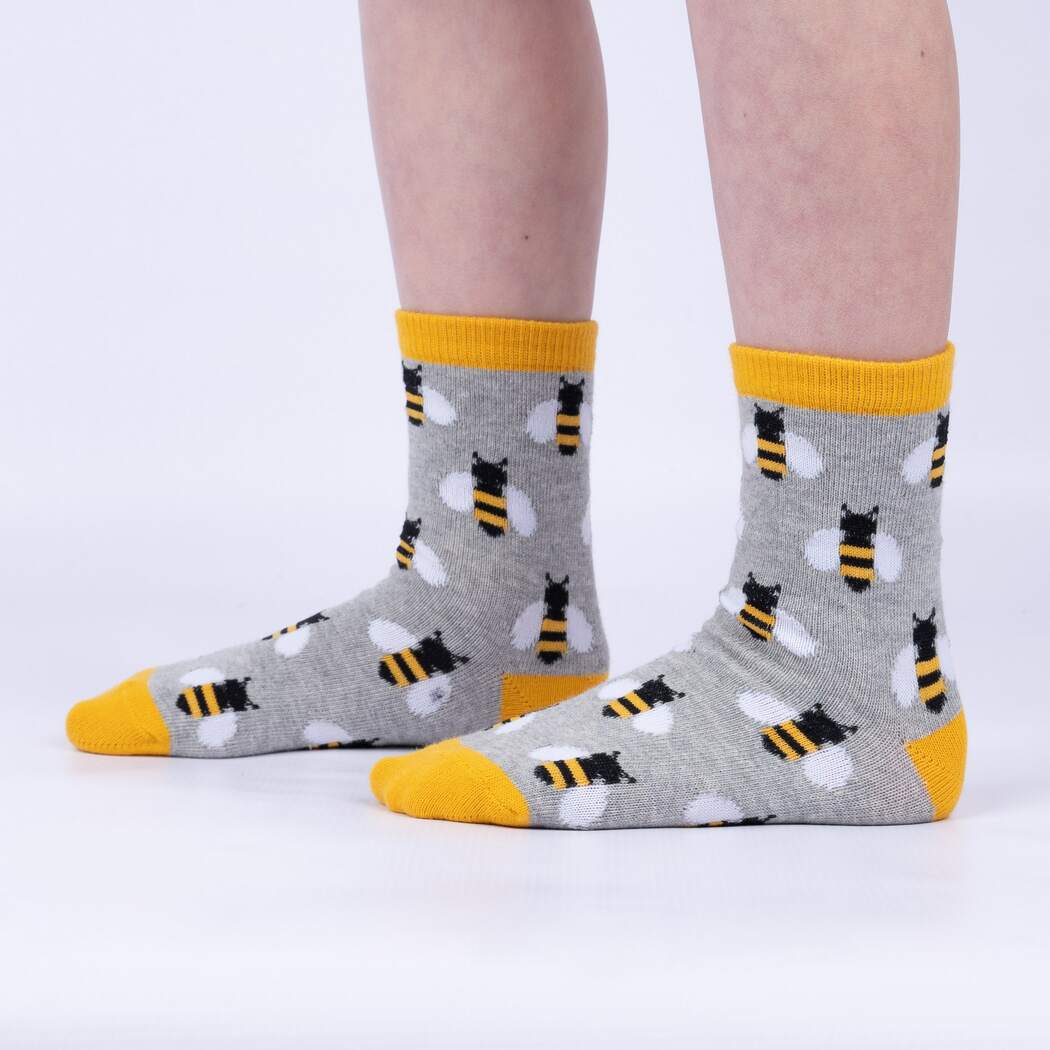 Child pair of gray Sock It To Me socks with bees