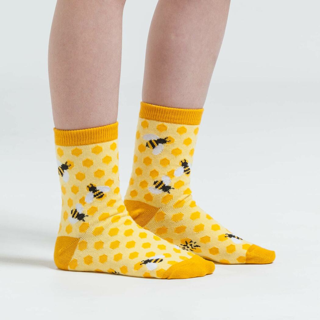 Child pair of yellow Sock It To Me socks with bees