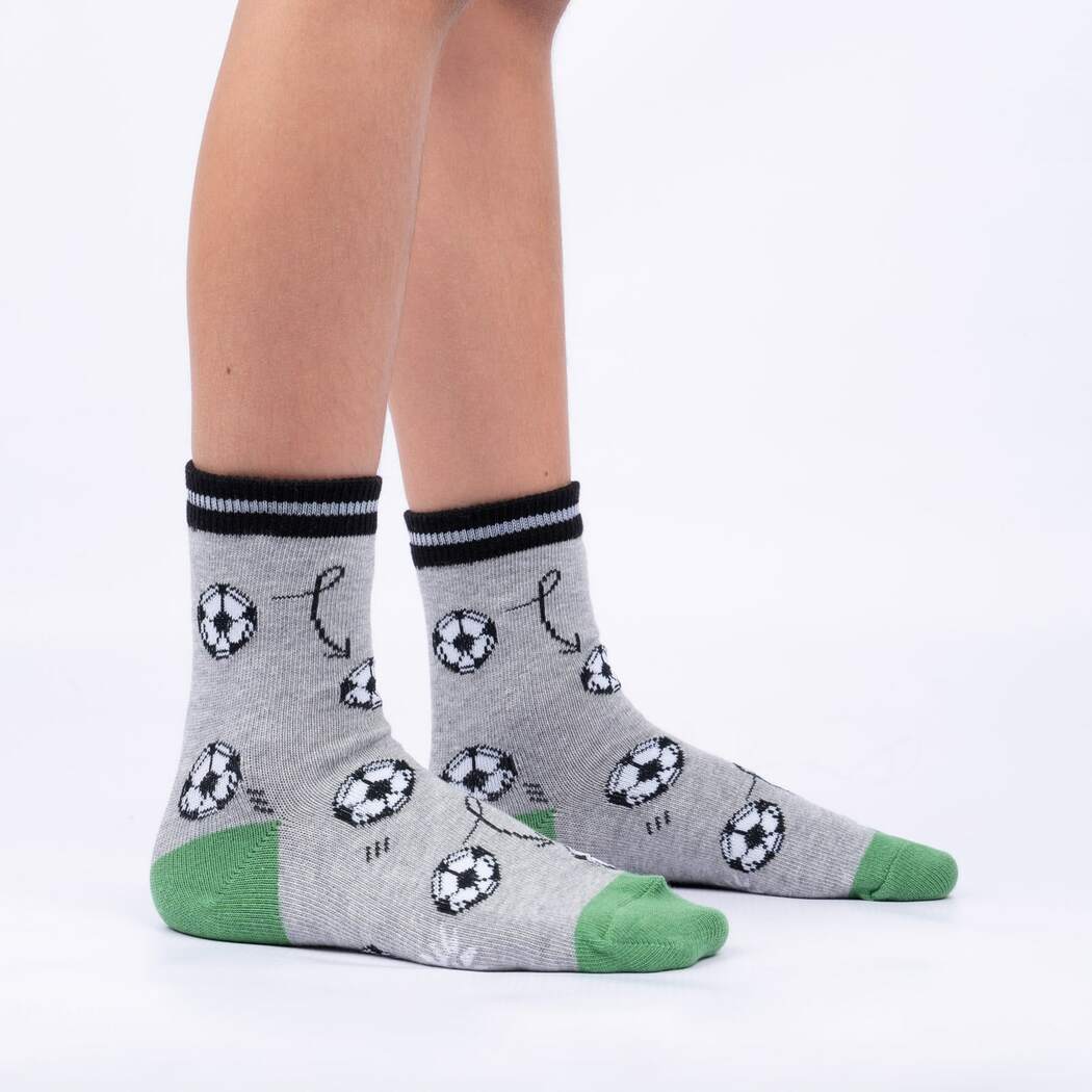 Sock It To Me Let&#39;s Kick It 3-pack kids&#39; socks Soccer balls with arrows on model