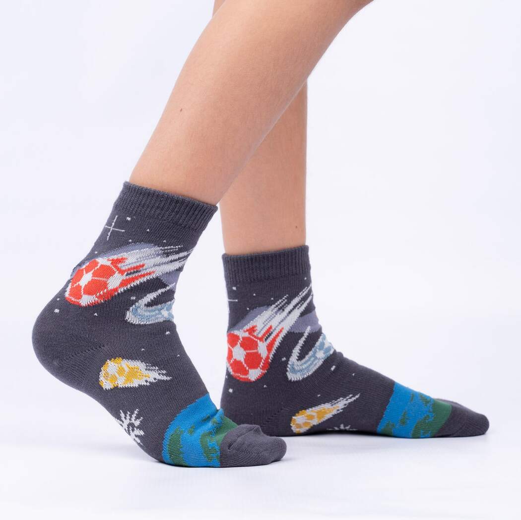 Sock It To Me Let&#39;s Kick It 3-pack kids&#39; socks Soccer Balls in Outer Space socks on model