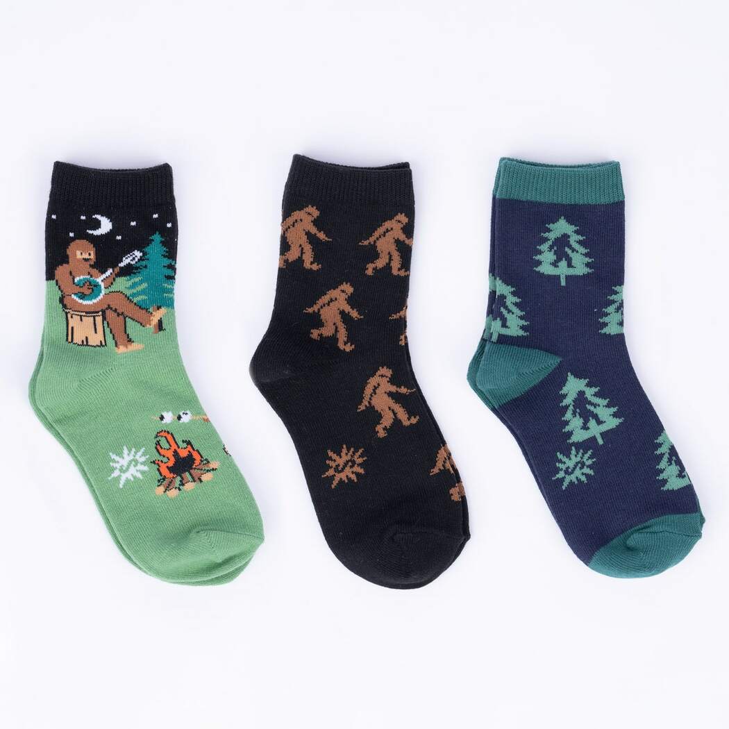 Sock It To Me Sasquatch Camp Out 3-pack kids&#39; crew socks featuring three styles of sasquatch-themed socks on display