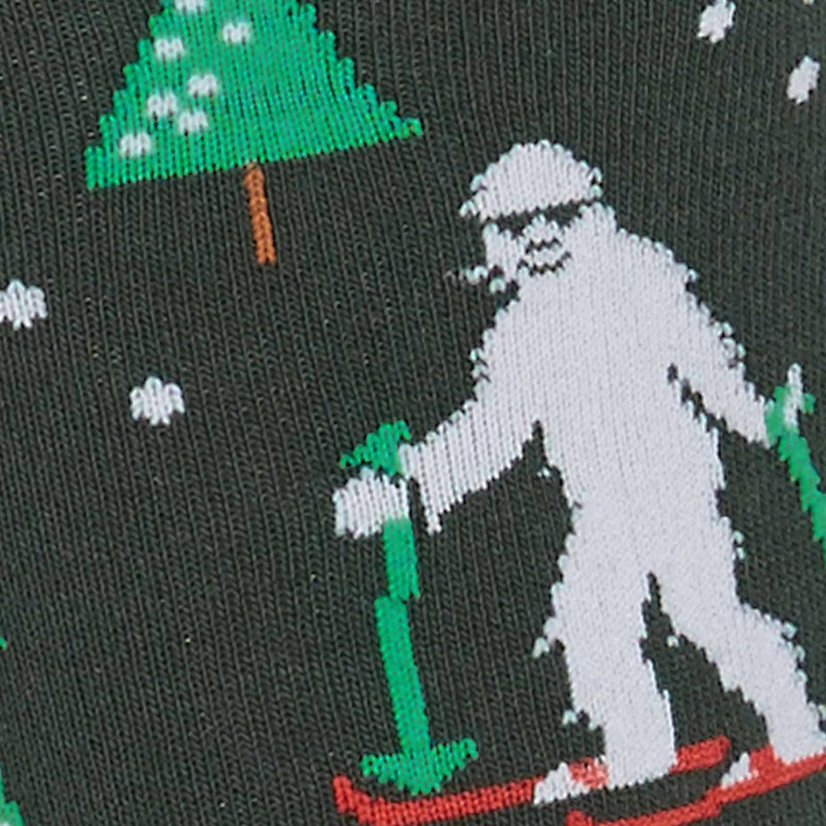 Detail of Sock It To Me Ready, Yeti, Go! men&#39;s crew sock featuring brown Sasquatch and white Yeti on skis.