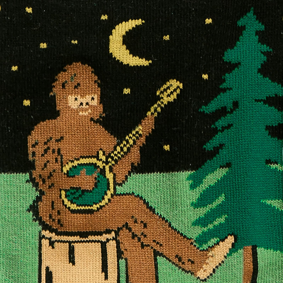 Sock It To Me Sasquatch Camp Out men&#39;s socks detail showing Sasquatch playing a big banjo