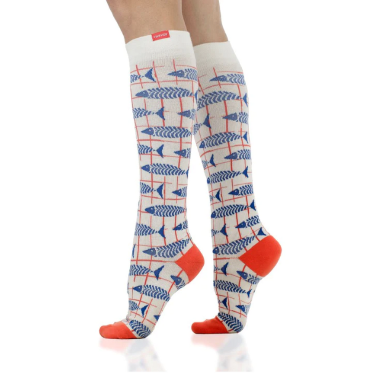 Vim &amp; Vigr Bone Fish moderate graduated compression (15-20 mmHg) women&#39;s and men&#39;s sock featuring knee high white sock with blue fish worn by model