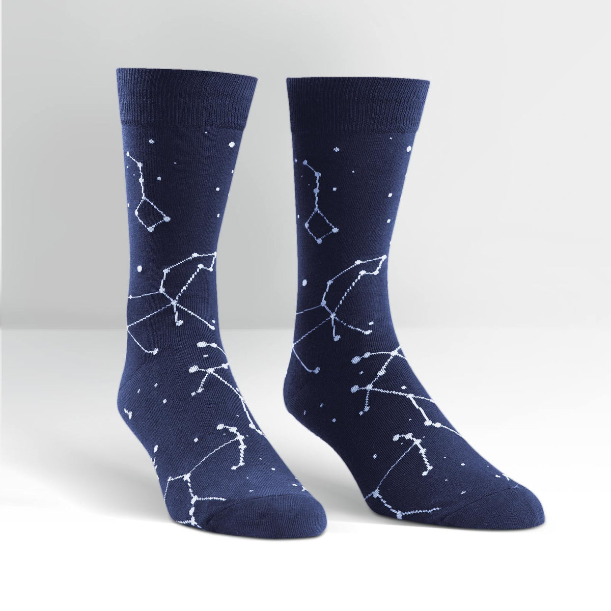 Sock It To Me Constellation (GLOWS IN THE DARK!) men&#39;s navy blue sock featuring constellations all over on display feet