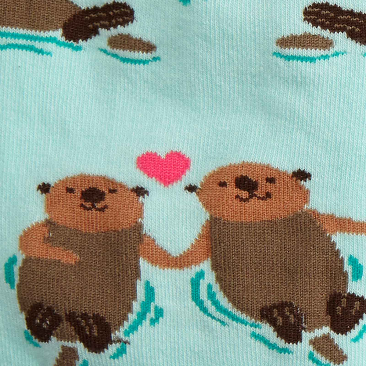 Sock It To Me My Otter Half women&#39;s socks detail showing otters in ocean holding hands with a heart